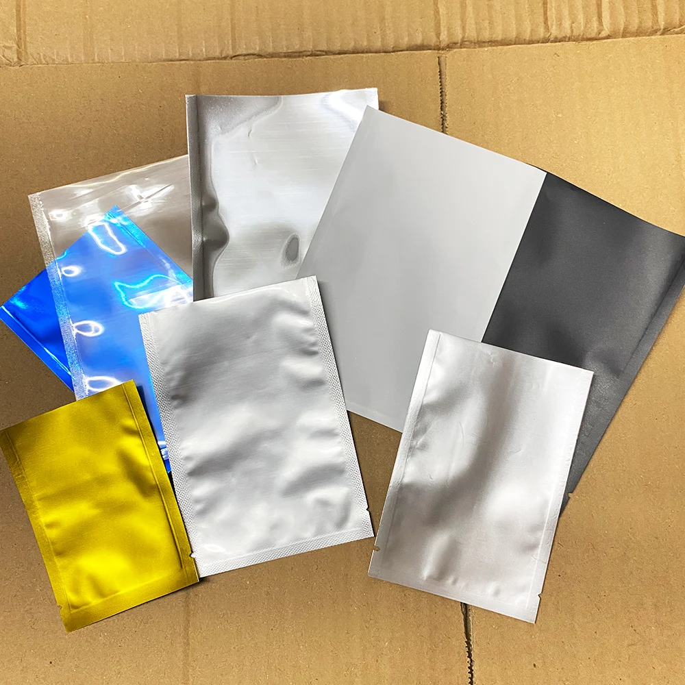 Бесплатная доставка 1 Упаковка упаковочных пакетов из 100 ПЭТ алюминиевой фольги Цветные Плоские пакеты Вакуумный упаковочный пакет Пакет для порошковой герметизации